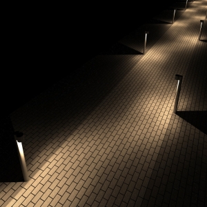 Arch Bollard I-Beam luminaires lighting a brick pathway at night