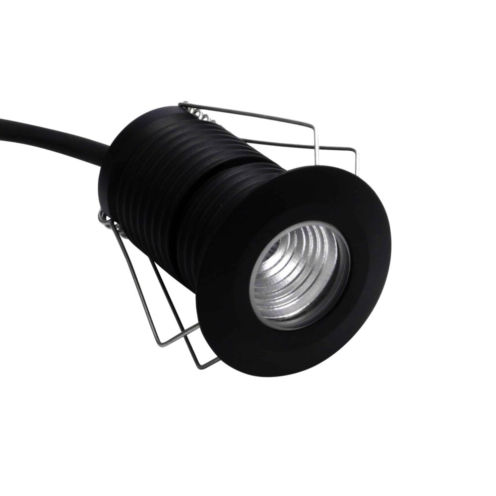 LuxR Modux Two Round Recessed Plug in black with its spring clips